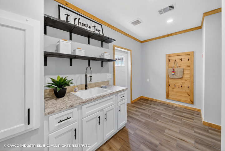 The Satilla 32764D | 4 bedroom, 2 bathroom, 2254 sqft home | Built by Cavco - Moultrie in Moultrie, GA.
