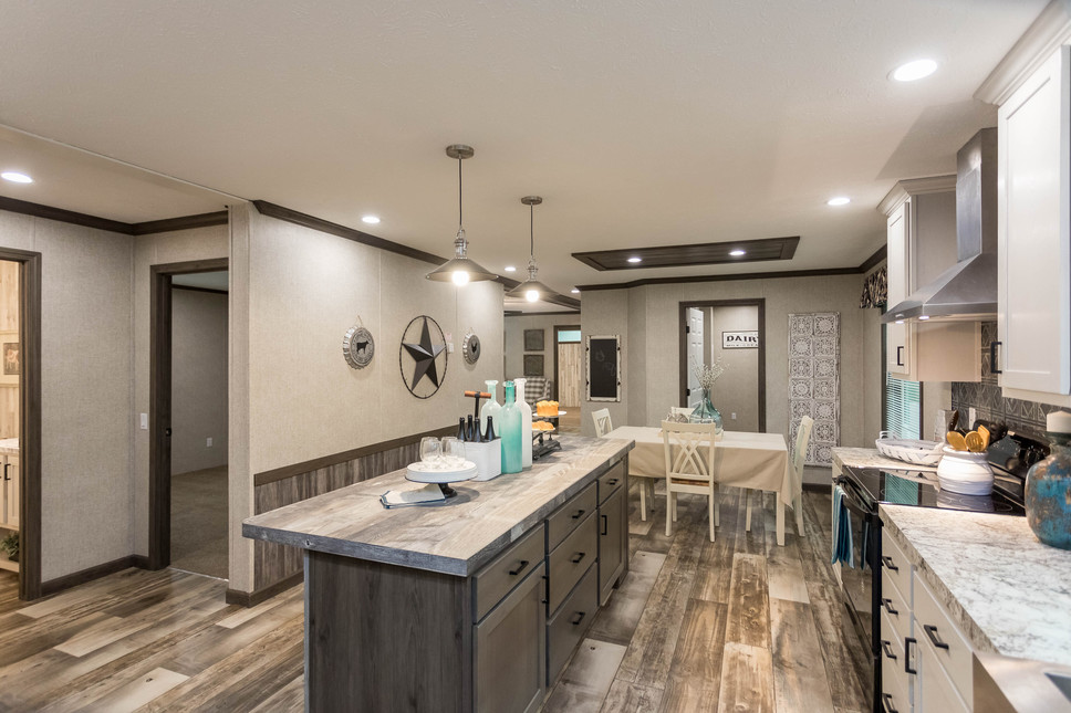 Gorgeous Open Kitchen and Dining Room in the Fairmont Hyatt Manufacture Home Model#186046.