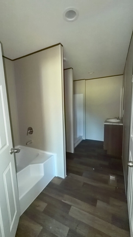 Has the option of adding in a garden tub along with the walk in shower!