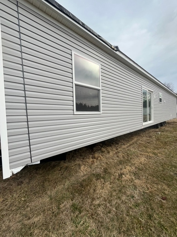 Sliding glass doors off of the back of home