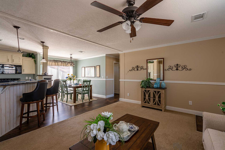 *pictured island feature is no longer offered* Bannister 28523C | 3 bedroom, 2 bathroom, 1387 sqft home | Built by Cavco - Moultrie in Moultrie, GA.