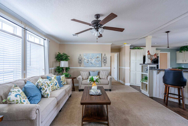 *pictured island feature is no longer offered* Bannister 28523C | 3 bedroom, 2 bathroom, 1387 sqft home | Built by Cavco - Moultrie in Moultrie, GA.
