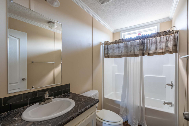 Bannister 28523C | 3 bedroom, 2 bathroom, 1387 sqft home | Built by Cavco - Moultrie in Moultrie, GA.