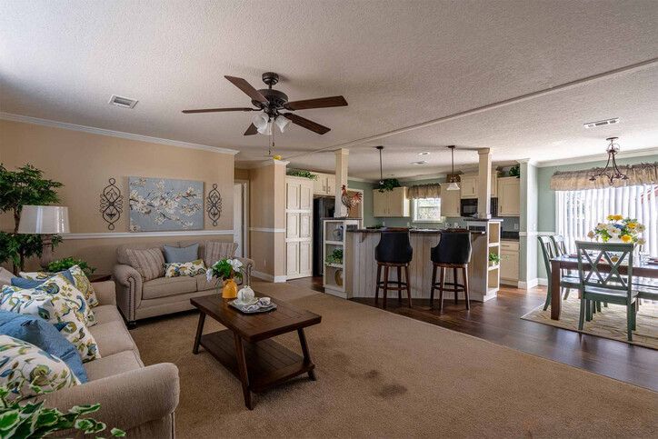*pictured island feature is no longer offered* Bannister 28523C | 3 bedroom, 2 bathroom, 1387 sqft home | Built by Cavco - Moultrie in Moultrie, GA.
