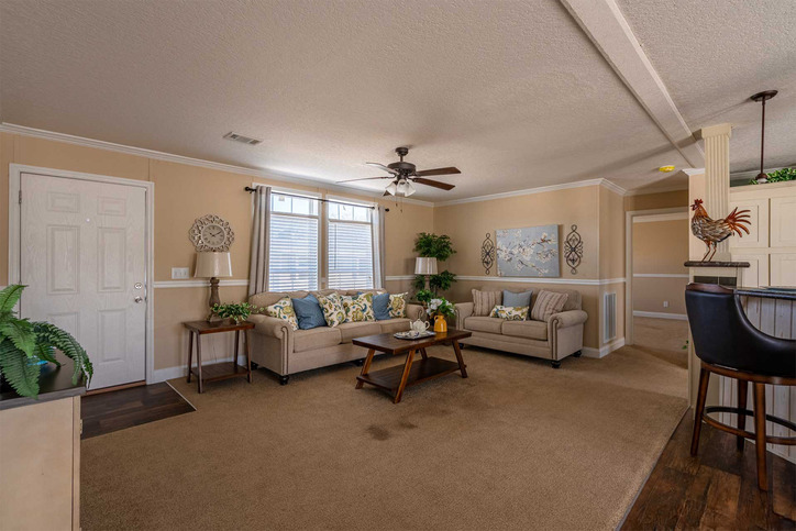 *pictured island feature is no longer offered* Bannister 28523C | 3 bedroom, 2 bathroom, 1387 sqft home | Built by Cavco - Moultrie in Moultrie, GA.