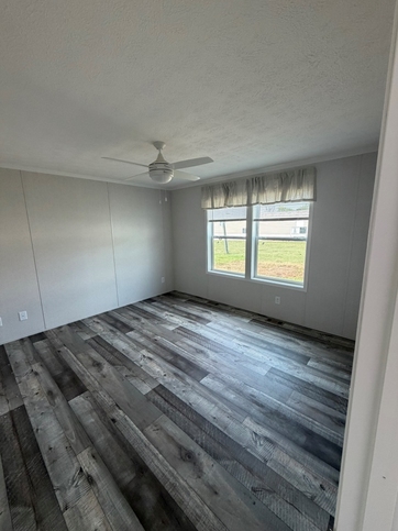 Master bedroom with ceiling fan