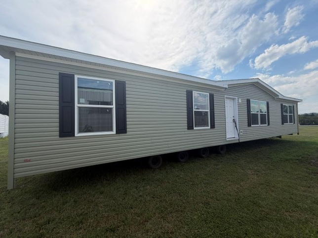 Cypress siding with black shutters
