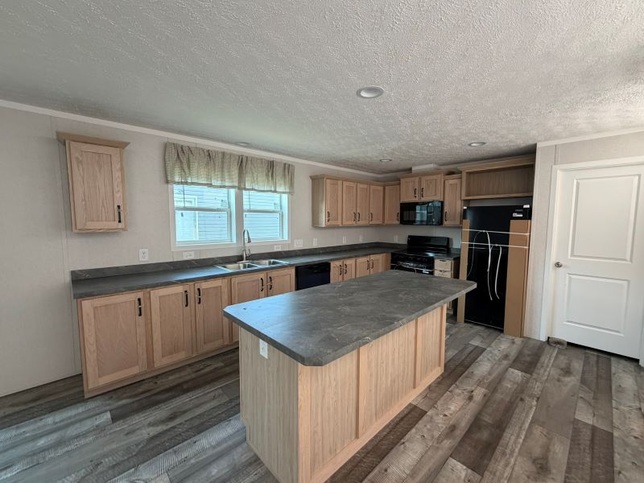 30" Rustic elm oak cabinets with center shelves. Roco Bosco counters throughout. 
