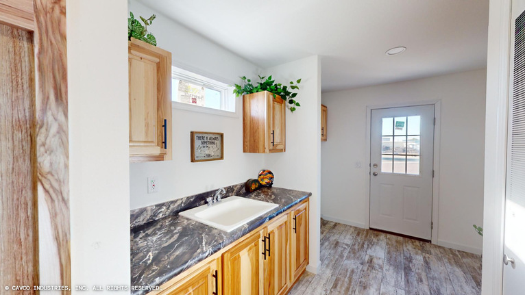 The Remington 28764B | 4 bedroom, 2 bathroom, 2099 sqft home | Built by Cavco - Montevideo in Montevideo, MN.