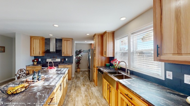 The Remington 28764B | 4 bedroom, 2 bathroom, 2099 sqft home | Built by Cavco - Montevideo in Montevideo, MN.