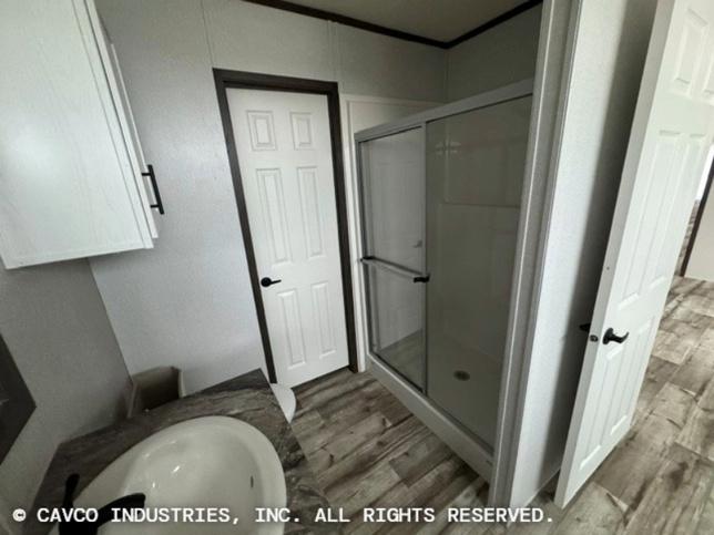 Landmark 16763E | 3 bedroom, 2 bathroom, 1178 sqft home | Built by Cavco - Waco in Waco, TX.
