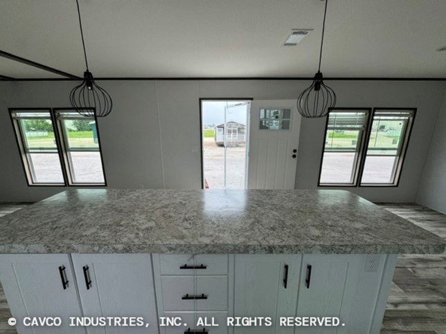 Landmark 16763E | 3 bedroom, 2 bathroom, 1178 sqft home | Built by Cavco - Waco in Waco, TX.