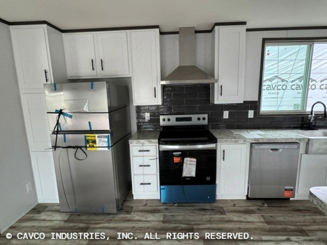 Landmark 16763E | 3 bedroom, 2 bathroom, 1178 sqft home | Built by Cavco - Waco in Waco, TX.