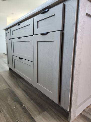 Real wood kitchen island featuring a trash can pull-out, five soft-close drawers, and a cabinet with a soft-close door!

#ABetterWayToBuild