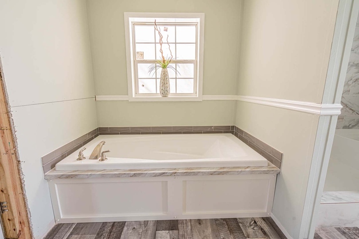 Camron 28563F | 3 bedroom, 2 bathroom, 1494 sqft home | Built by Cavco - Moultrie in Moultrie, GA.