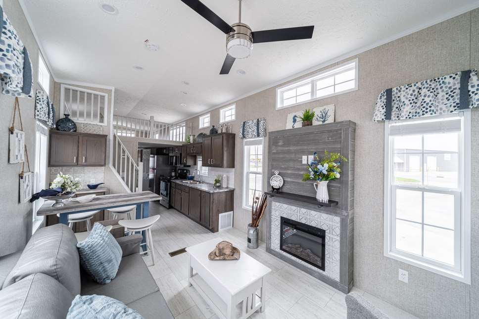 Park Model 190011 by Fairmont is simply stunning - from the loft to the fireplace to the front door.

