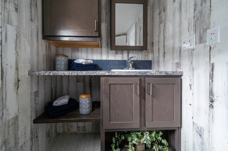 This bathroom is packed with everything you need in convenience and style to feel at home in model 190011 by Fairmont Homes

