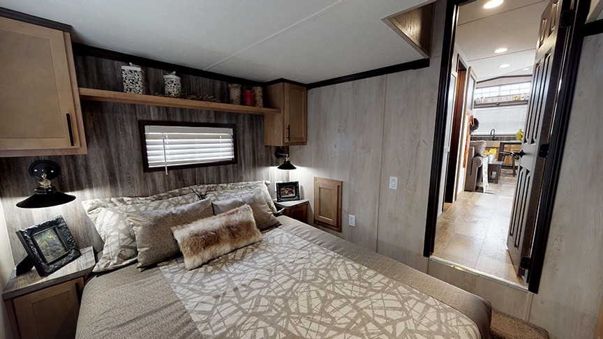 Great built-ins in this bedroom in the 100170 park model by Fairmont Homes.