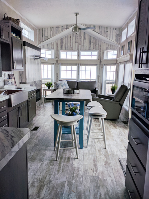 Tons of Tons of natural light, eat in island and more in Fairmont's Park Model 148038.
.
