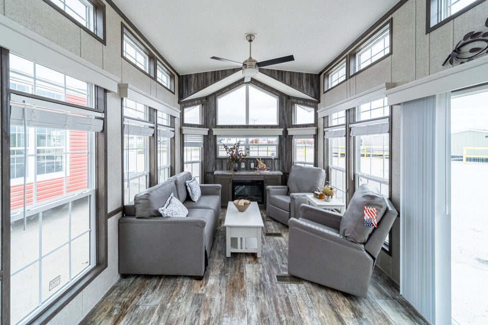 Bring the outdoors in with the 100171 Country Manor park model home by Fairmont Homes.

