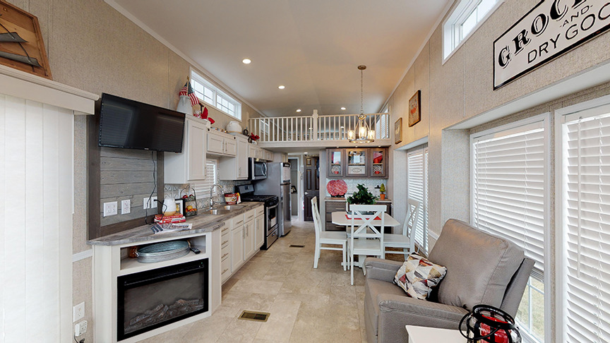 Lovely corner fireplace and media center in park model 100169
