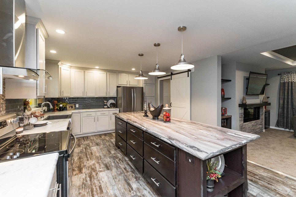 The Charlotte 92602 modular home kitchen with large island