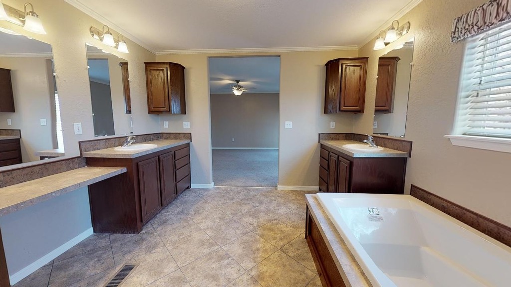 Large shower area and a sit down tub