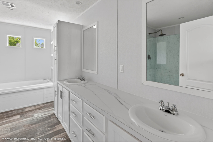 Palm Harbor Elite 32563F | 3 bedroom, 2 bathroom, 1717 sqft home. Built by Cavco Seguin in Seguin, TX.