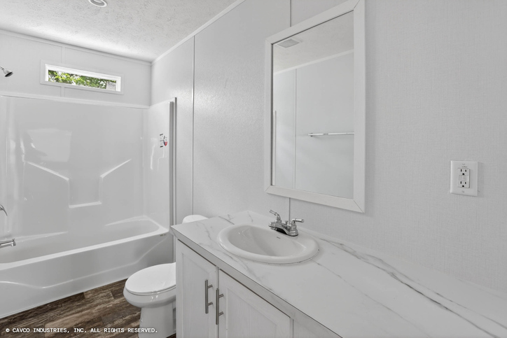 Palm Harbor Elite 32563F | 3 bedroom, 2 bathroom, 1717 sqft home. Built by Cavco Seguin in Seguin, TX.