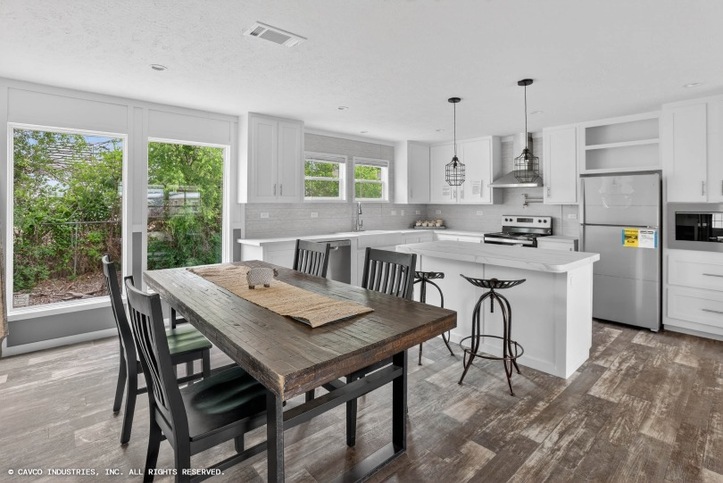 Palm Harbor Elite 32563F | 3 bedroom, 2 bathroom, 1717 sqft home. Built by Cavco Seguin in Seguin, TX.