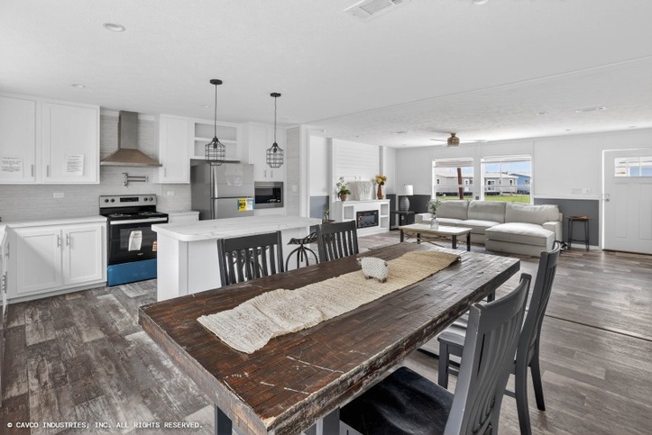 Palm Harbor Elite 32563F | 3 bedroom, 2 bathroom, 1717 sqft home. Built by Cavco Seguin in Seguin, TX.