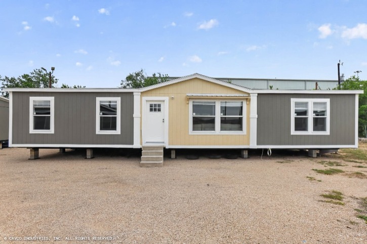 Palm Harbor Elite 32563F | 3 bedroom, 2 bathroom, 1717 sqft home. Built by Cavco Seguin in Seguin, TX.