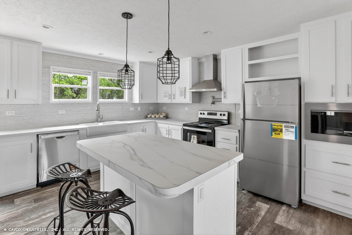 Palm Harbor Elite 32563F | 3 bedroom, 2 bathroom, 1717 sqft home. Built by Cavco Seguin in Seguin, TX.