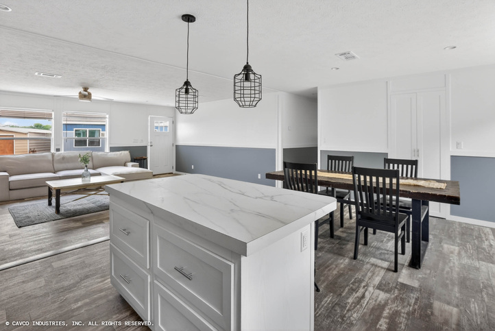 Palm Harbor Elite 32563F | 3 bedroom, 2 bathroom, 1717 sqft home. Built by Cavco Seguin in Seguin, TX.
