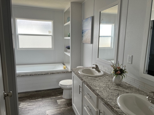 This Bathroom Feels like a Spa with Relax in this Soaker tub!
Separate Walk In Shower and His and Her Sinks, and Lots of Storage