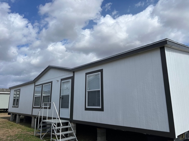 Smart Panel Exterior With Lots of Color Options and Composition Roof 
(Can be upgraded to metal roof)