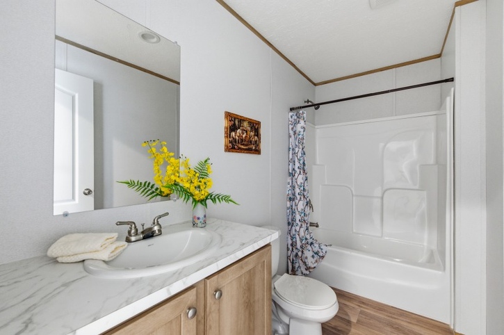 Phoenix 32764A | 4 bedroom, 3 bathroom, 2280 sqft home | Built by Cavco - Hamlet in Hamlet, NC.