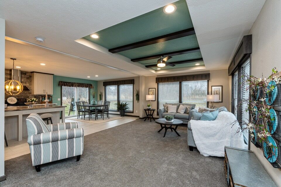 Beautiful tray ceiling and wooden beams in the Lincoln model by Friendship homes