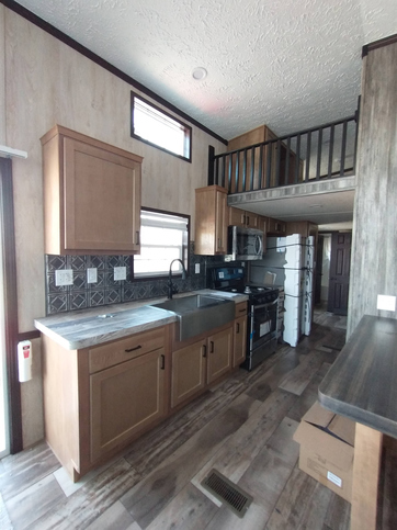 Country Manor 100178 Park Model | 2 bedroom, 1 bathroom, 399 sqft home. Built by Cavco - Nappanee in Nappanee, IN.