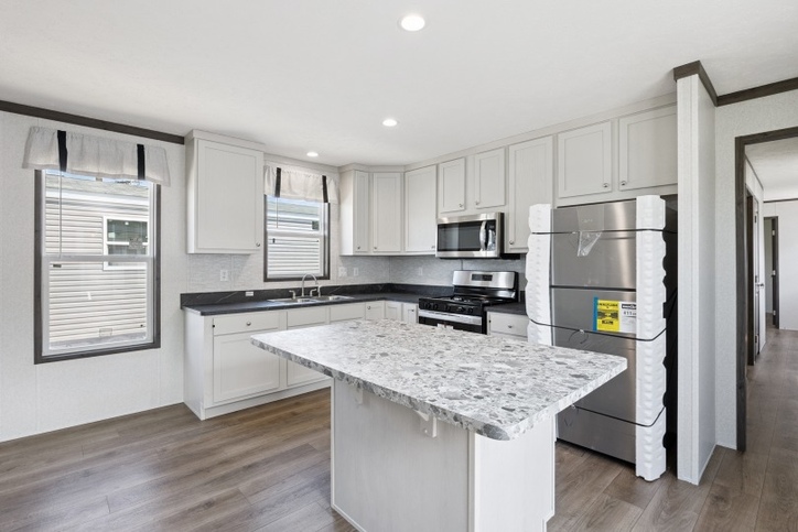 Daisy | 3 bedroom, 2 bathroom, 1104 sqft home. Built by Cavco - Waco in Waco, TX. National Community house.