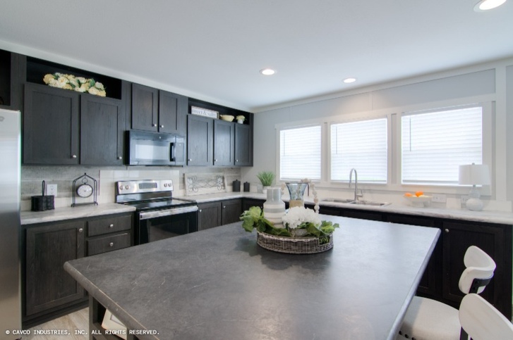 Sycamore 32563A | 3 bedroom, 2 bathroom, 1680 sqft home. Built by Cavco - Lancaster in Lancaster, TX.