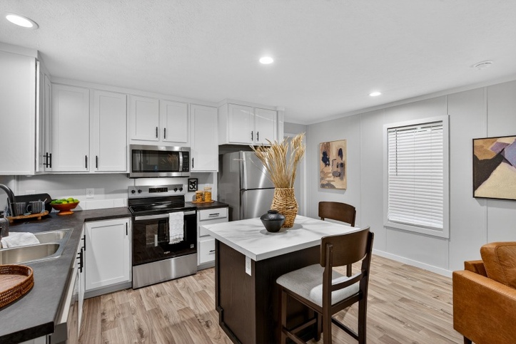 Violet | 3 bedroom, 2 bathroom, 1165 sqft home. Built by Cavco - Rocky Mount in Rocky Mount, VA. National Community house.