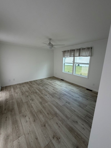 Master bedroom with ceiling fan