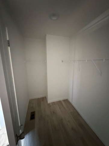 Inside view of master bedroom closet