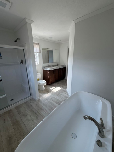 Master bathroom with soaking tub and walk in shower