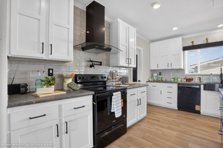 La Sierra 47684A | 4 bedroom, 2 bathroom, 2426 sqft home. Built by Cavco - Austin in Austin, TX