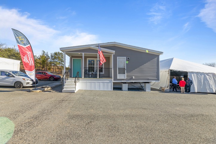 Black line drawing for The Cumberland - First HUD Approved Nationally Available Duplex | Side A: 2 bedroom, 1 bathroom, 1050 sqft | Side B: 2 bedroom, 1 bathroom, 1050 sqft. Double porch