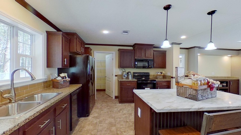 Piper 28644A | 4 bedroom, 2 bathroom, 1707 sqft home | Built by Cavco - Moultrie in Moultrie, GA.