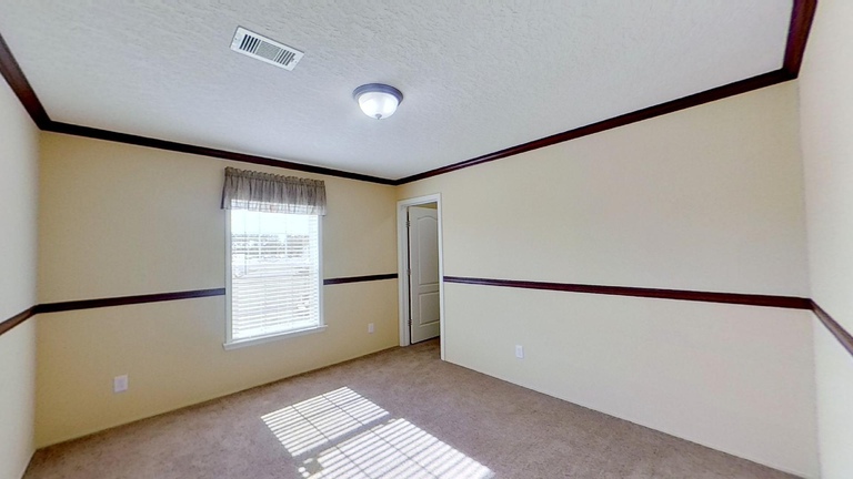 Piper 28644A | 4 bedroom, 2 bathroom, 1707 sqft home | Built by Cavco - Moultrie in Moultrie, GA.