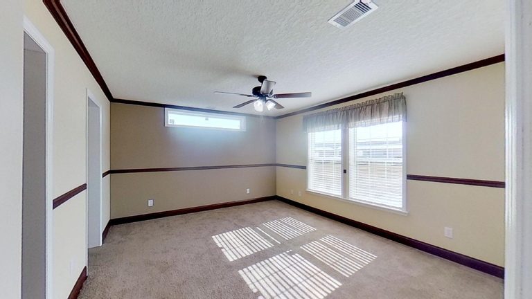 Piper 28644A | 4 bedroom, 2 bathroom, 1707 sqft home | Built by Cavco - Moultrie in Moultrie, GA.